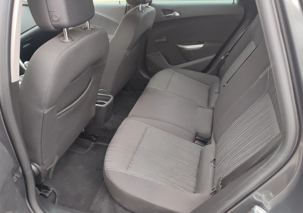 Opel Astra cena 24999 przebieg: 118000, rok produkcji 2011 z Puszczykowo małe 191